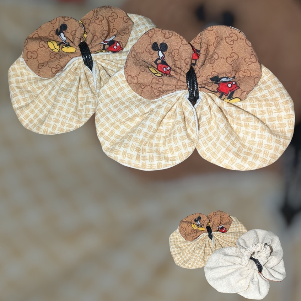 THREE SETS OF TWO BROWN TONED HAIR ACCESSORIES